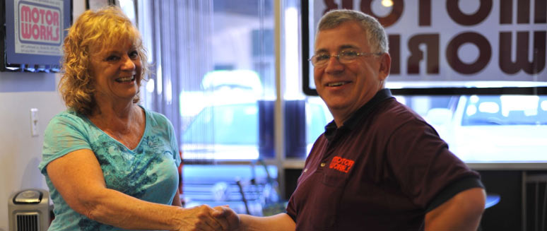 Greg Skolnik with Customer | Motor Works Shop